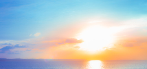 Fototapeta na wymiar bright sunrise at sea,blurred background