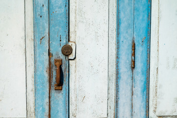 old wooden door with lock blue color