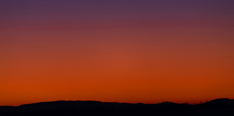 evening sky at sunset the color of lush lava