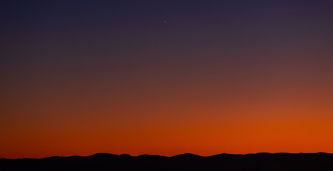 evening sky at sunset the color of lush lava