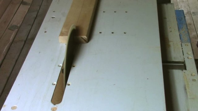 In carpentry stodio workplace. Wood processing woodworking close-up. Process of creating  handmade wooden product.