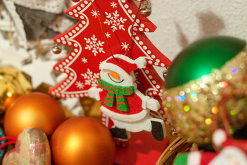 Christmas ornament of a snowman with scarf and hat