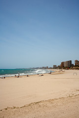 Fototapeta na wymiar beach with umbrellas spain Playa de San Juan