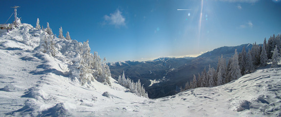 Sunny Winter Day With The Mountains Full Of Snow, Poiana Brasov, Romania, panorama