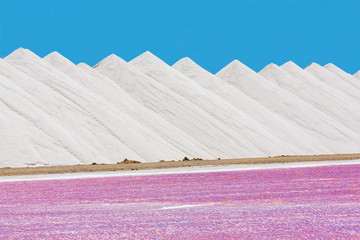 Salt mountains with pink salt lake