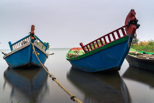 Fishing boats parked near still lake of Bhigwan, Maharashtra