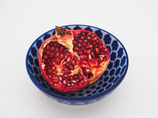 Pomegranate in a blue bowl 