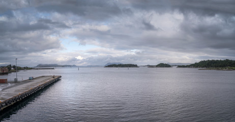 Fototapeta na wymiar clouds on fjord, Floro, Norway