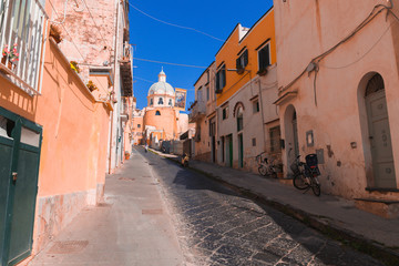 Panoramic view of beautiful Procida on a sunny summer day. Colorful cafes, houses and restaurants,...