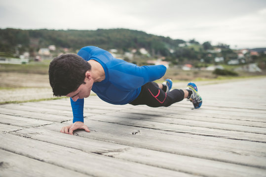 Runner doing strength training outdoors