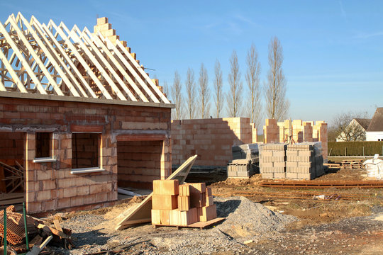 detached house under construction in a village