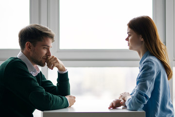 man and woman shaking hands