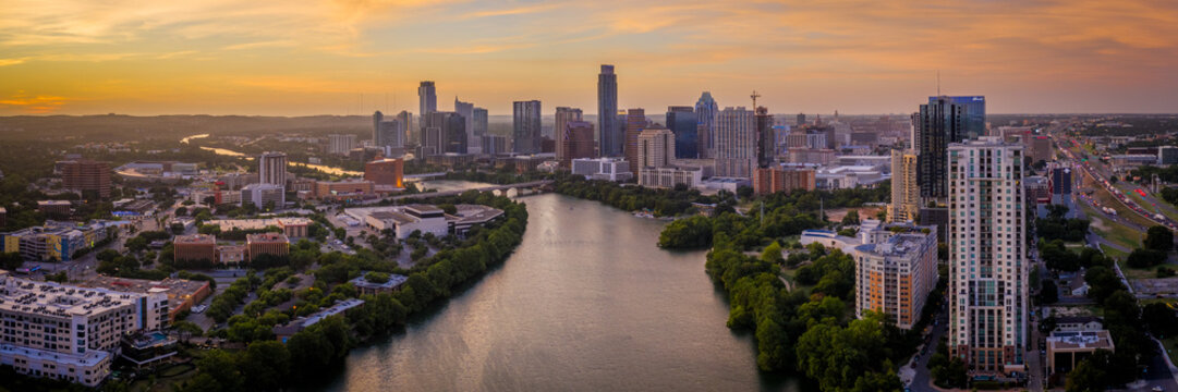 Austin Skyline Panoramic photo with Colorado River winding by downtown 