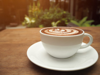 cup of coffee on table in coffee shop cafe