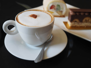 cup of coffee on table in coffee shop cafe