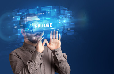 Businessman looking through Virtual Reality glasses with FAILURE inscription, innovative security concept