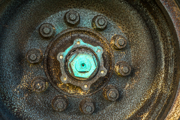 Detail of a weathered wheel hub.