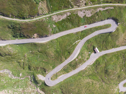 A winding and twisting road through the Swiss mountains