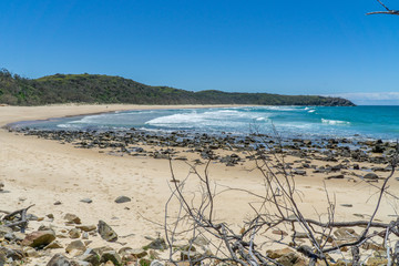 the beautiful beach of Noosa on the sunshine coast in Australia with beautiful weather and blue sky with white clouds