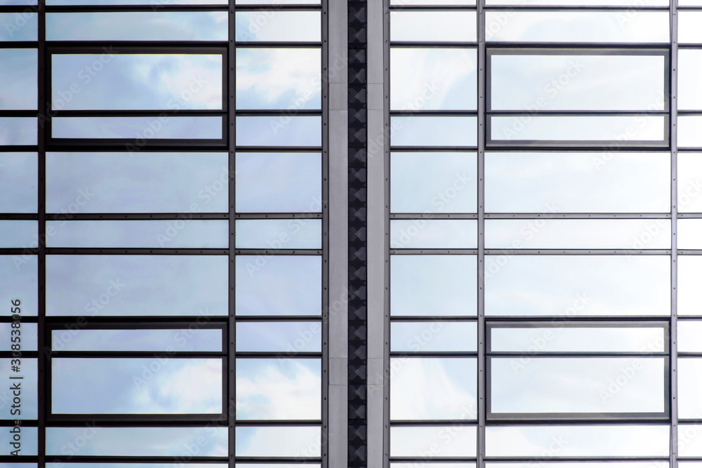 Poster realistic though unreal reworked photo of modern glass architecture. windows of different shapes. fi
