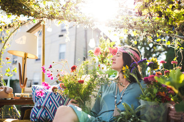peaceful woman in a vintage styled garden