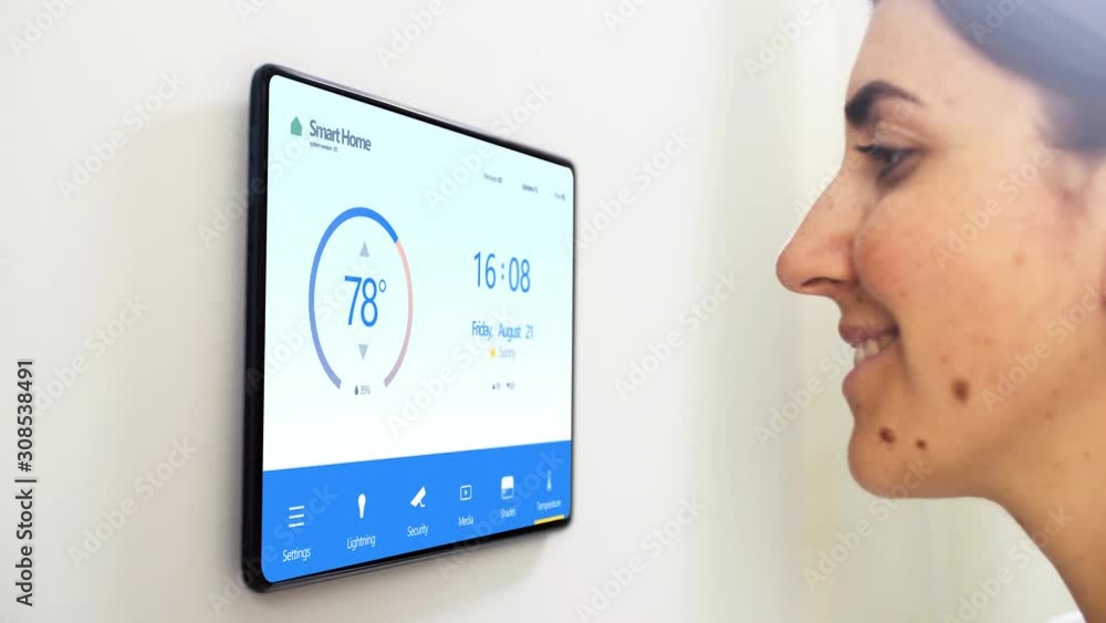 Poster automation, internet of things and technology concept - woman looking at tablet pc computer with sma