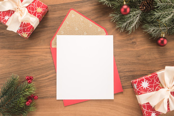 Fototapeta na wymiar Red envelope on christmas holiday background