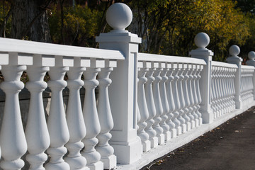 view of the beautiful white stone fence fence with balusters