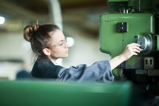 industrial plant with an engineer female working
