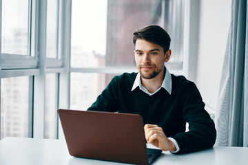 businessman working on laptop in office
