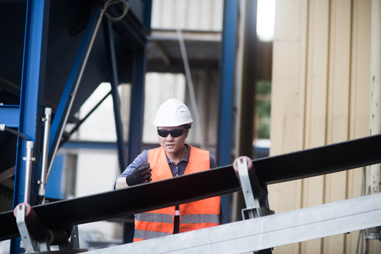 young worker in a concrete factory