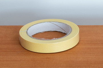 Yellow adhesive masking paint paper.