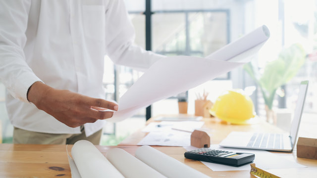 Architect or engineer working in office