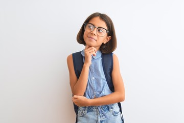 Beautiful student child girl wearing backpack and glasses over isolated white background with hand...