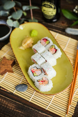 sushi with salmon and avocado. Sushi roll with salmon and tempura shrimp