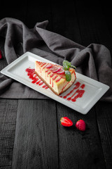 Dessert Cheesecake. Restaurant menu. Background black boards.