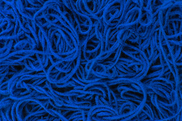 Classic blue. Knitted fabric. Knitted fabric background. Pantone color 2020. Color trend.