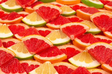 Pomelo and grapefruit slices background.