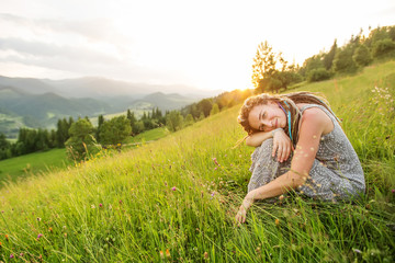 Beautiful dreadlock woman in mountains