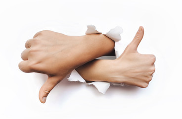 Like and dislike. Thumbs up and down sign of a man's and woman hand. The wrist came out through the...