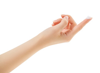 Beautiful female hand with the cream smear on finger.