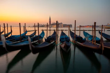Fotobehang Sunrise at Venice with gondola and island of st george view from the square San marco © k_samurkas