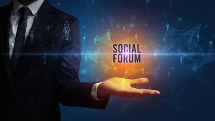 Elegant hand holding SOCIAL FORUM inscription, social networking concept