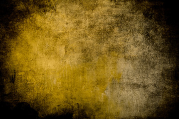 Yellow stained grungy canvas backdrop