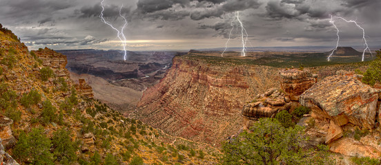 Grand Canyon from the Desert View Trail a mile east of the historic Watch Tower with a lightning storm rolling into the area, Grand Canyon National Park, Arizona