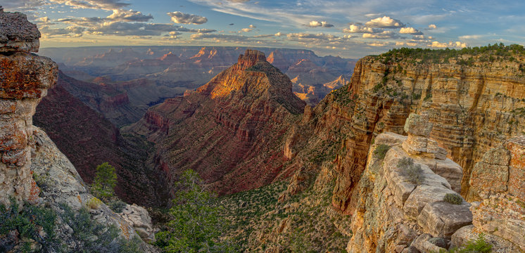 Panorama of Grand Canyon viewed from Buggeln Point just east of Buggeln Hill on the South Rim around sundown, Grand Canyon National Park, Arizona