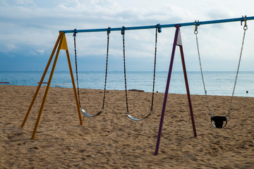 Swing on the beach by the ocean