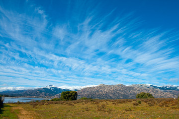 General view of the Guadarrama Range National Park from its southern slope on a sunny winter day.