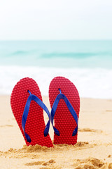 beach shoes by the ocean