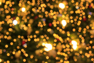 Fototapeta na wymiar Abstract backdrop of bokeh from Christmas lights.
